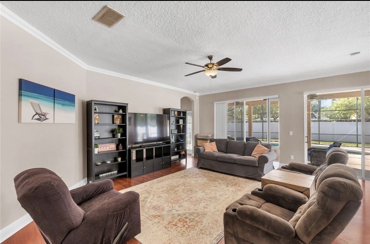 Family room with pool views